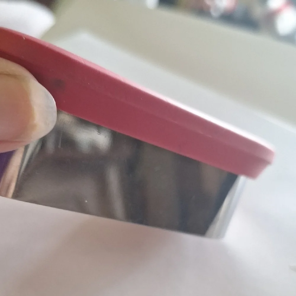 Red Candy Cane Shaped Object